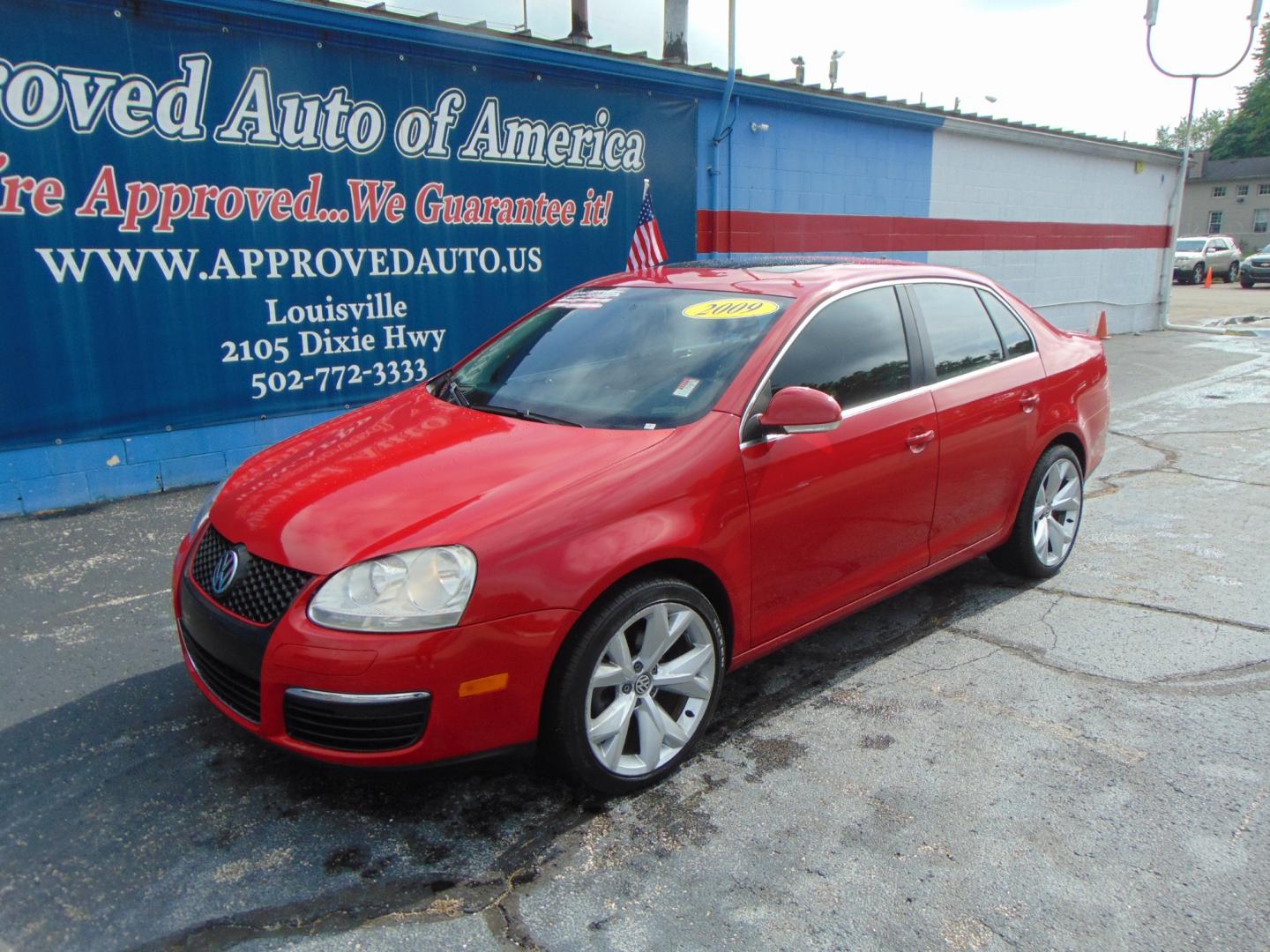 2009 Red Volkswagen Jetta (3VWRM71K49M) with an 5-Cyl 2.5 Liter engine, Automatic, 6-Spd w/Overdrive and Tiptronic transmission, located at 2105 Dixie Hwy, Louisville, KY, 40210, (502) 772-3333, 38.220932, -85.795441 - Photo#1